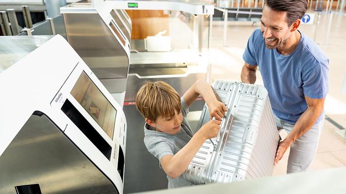 self-bag-drop-familie-en